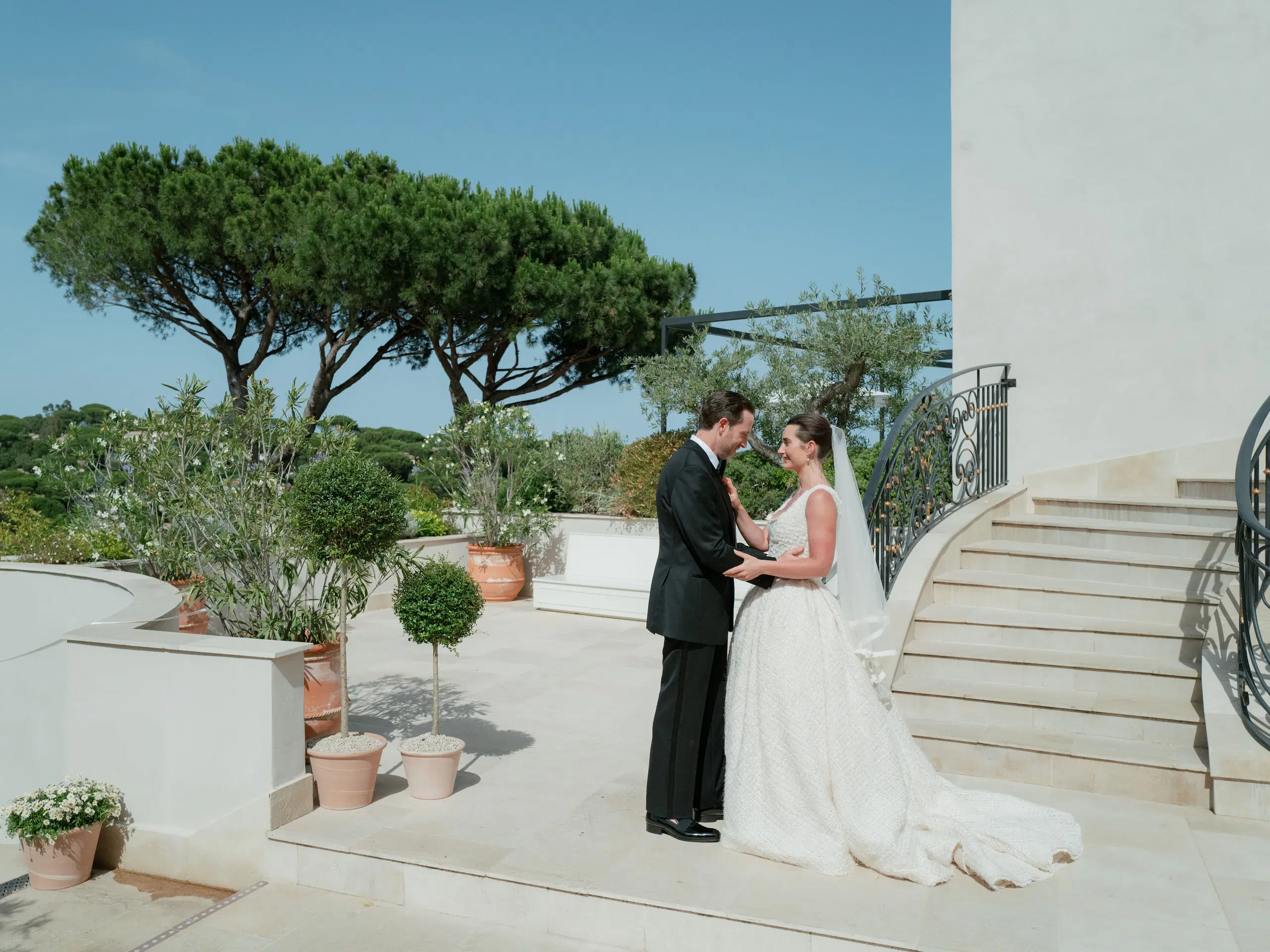 Bride with her bridesmaids in colorful gowns at an Easton Events wedding at Château de la Messardière in Saint-Tropez.